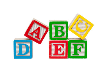 Wooden alphabet blocks isolated on white background