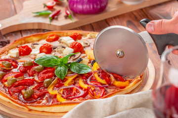 Delicious fresh pizza served on wooden table