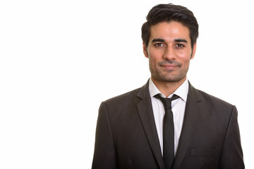 Young handsome Persian man against white background