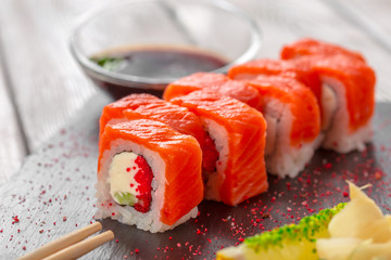 fresh sushi on rustic wooden table