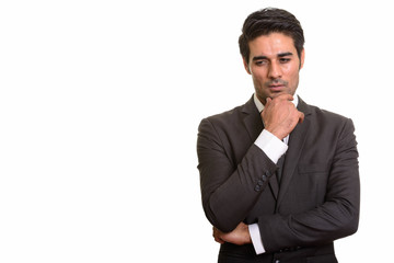 Young handsome Persian man against white background