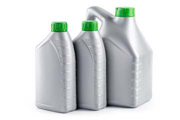 Plastic bottles from automobile oils isolated on a white background