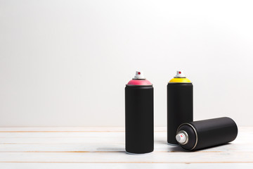 Spray paint cans close up