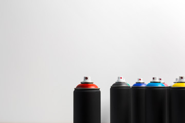Spray paint cans close up