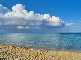 Shot of the beautiful tropical San Lorenzo beach near Syracuse in a sunny day of summer
