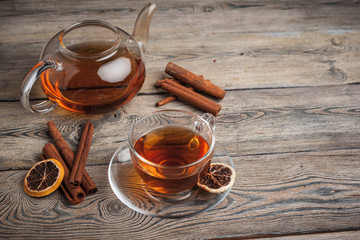 aromatic hot cinnamon tea on wooden table