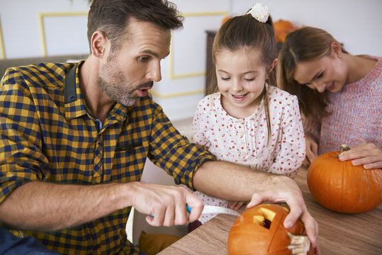 Family Carving Pumpkins For Halloween