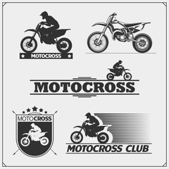 Set of motor sport silhouettes, labels and emblems. Motocross riders.