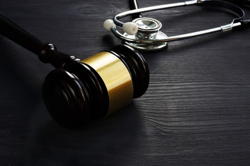 Gavel and stethoscope. Medical negligence concept.