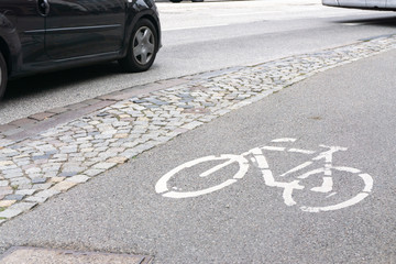 Bicycle path along a busy road