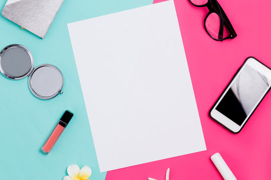 Flat lay top view photo. Mockup on a white colorful pink and blue background with womens accessories. Cute feminine image.