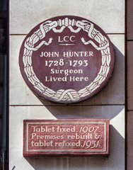London, England/UK - July 3rd 2018: Brown Plaque on site of where surgeon John Hunter lived