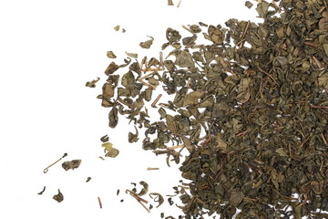 Green tea leaves isolated on white background, top view