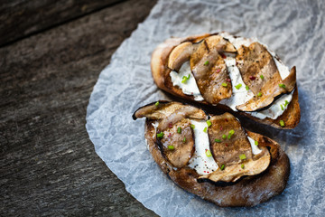 Bruschetta with porcini mushrooms and soft cheese