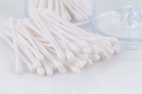 Cotton buds on a light background. Selective focus