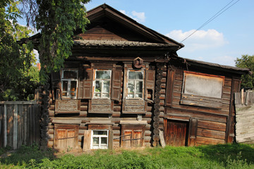 Fototapeta na wymiar Old wooden house in Siberia region, Tumen city