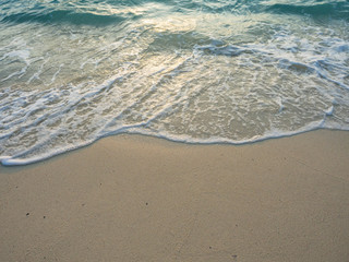 Fototapeta na wymiar Soft wave on the beach in the morning.
