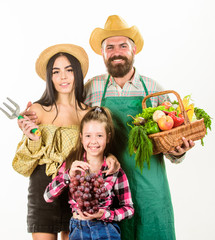 Family farmers gardeners basket harvest isolated white background. Parents and daughter farmers celebrate harvest holiday. Harvest festival concept. Family rustic style farmers proud of fall harvest