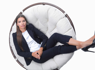 business woman thinking,sitting in a round chair