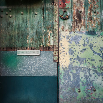 DETAIL OF OLD WOODEN DOOR, GREEN COLOR