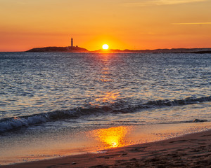 Sunset on cadiz beach with the trafalgar cape in the background © Alvaro