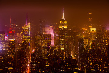 Fototapeta na wymiar New York city skyline and skyscraper at night,Beautiful night view in Midtown Manhatton