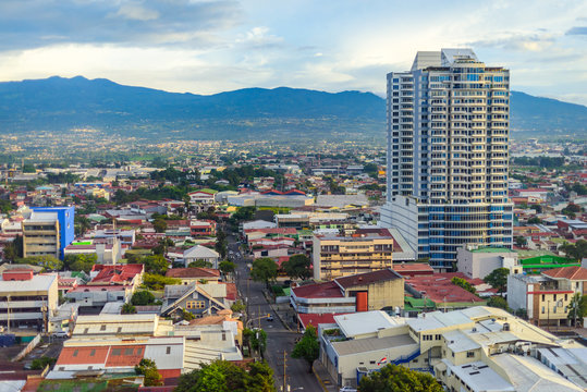 San Jose Costa rica capital city street view with mountains in the back