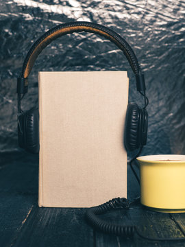 The concept of audio books on a dark background