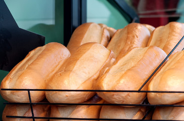 a loaf of bread is on the shelves at the bakery