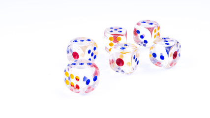 Dice isolated on White background with selective focus and crop fragment