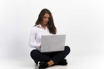 girl with lap top on white
