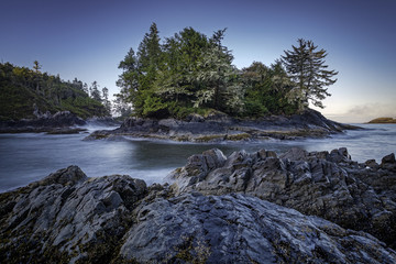 Naklejka premium Early morning sunrise at Crystal Cove near Tofino on Vancouver Island, British Columbia, Canada