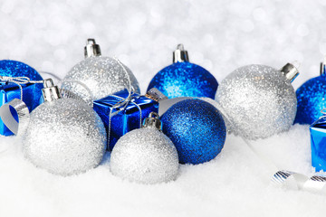 Christmas balls on snow