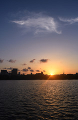Cityline sunset over water, Ohori park, Fukuoka, Japan