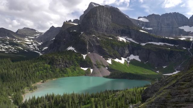 a zoom in view of grinnell lake at glacier national park in montana, usa