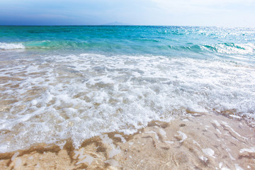 Obraz na płótnie Canvas Wave of sea on sand beach
