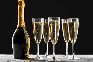 glasses of champagne with the bottle