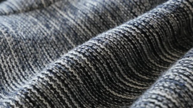 Gathers of knitted jersey fabrics slow pan 4K footage