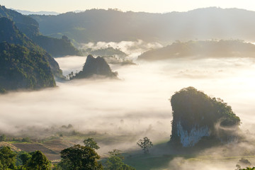 Beautiful scenery of mountain with mist in landscape. Winter fog in national park Phu Lang Ka , Phayao province, Thailand.