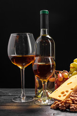 Wine and cheese on the table