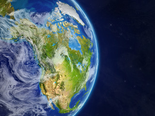 Fototapeta na wymiar North America from space on model of real planet Earth with highly detailed planet surface and clouds.