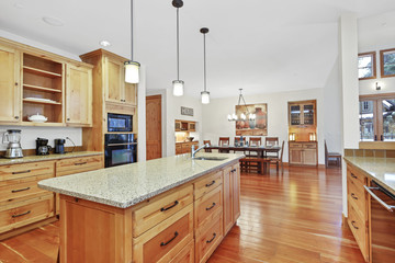 Beautiful kitchen with light wood cabinets