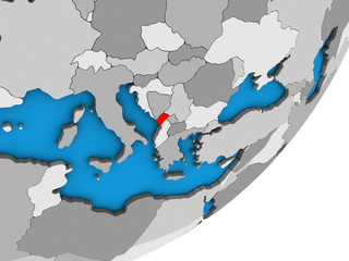 Montenegro on blue political 3D globe.