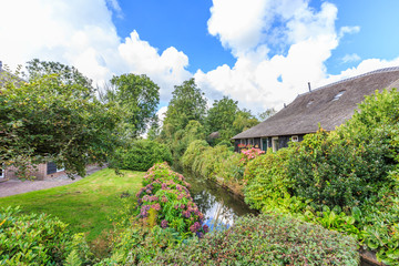 Noorderpad, Giethoorn, the Municipality Steenwijkerland, province of Overijssel, Netherlands, september 2, 2017:  Rural houses village of Giethoorn in historical tourist wetland area