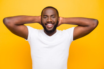 Handsome attractive manly cheerful mulato guy in white t-shirt w