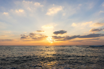 Fototapeta na wymiar Sunlight at sunset beach