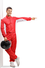 Racer leaning on a wall and pointing © Ljupco Smokovski