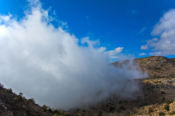 High mountain with blue sky with clouds landscape background.