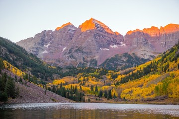 Maroon bells in autumn at sunrise - Colorado