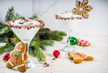 Ideas for Christmas drink, gingerbread martini cold cocktail. with gingerbread cookies, xmas tree...